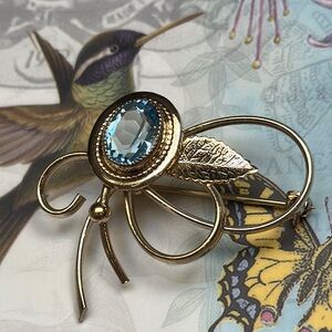 Elegant Gold & Light Blue Rhinestone Brooch - 1 1/2”